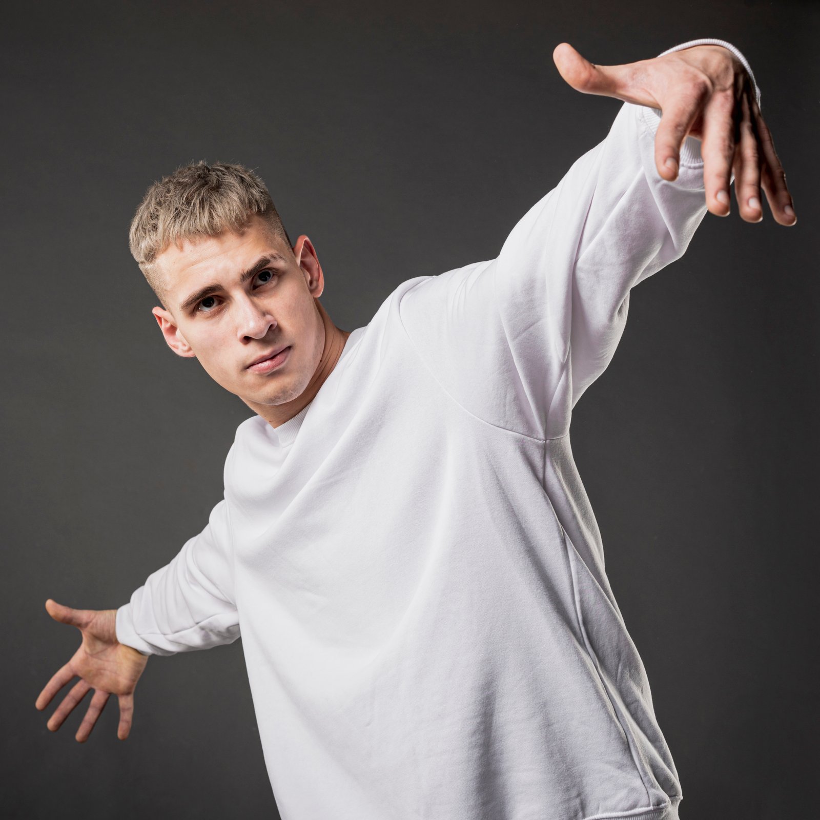 male-dancer-posing-while-making-hip-hop-move
